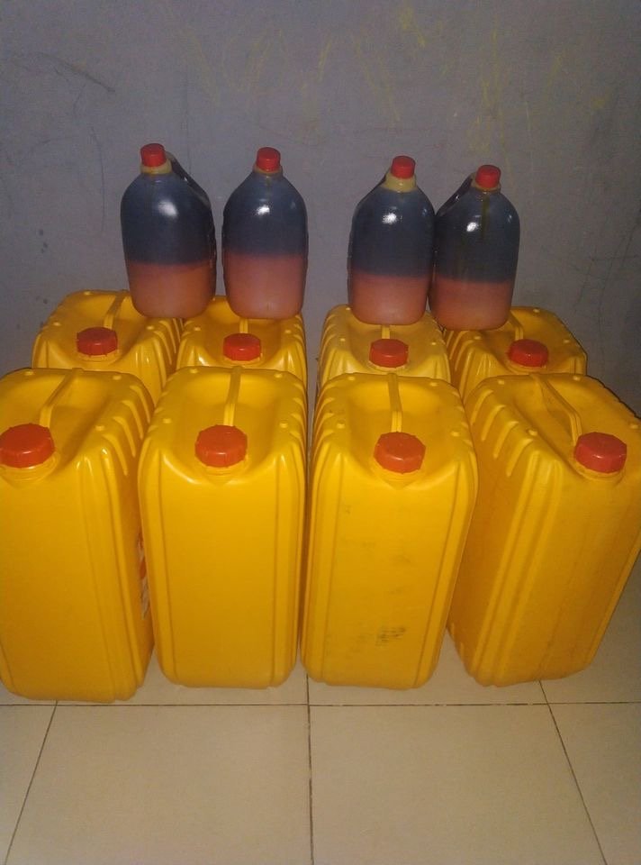 100 percent original palm oil filled into containers in a mill in uyo